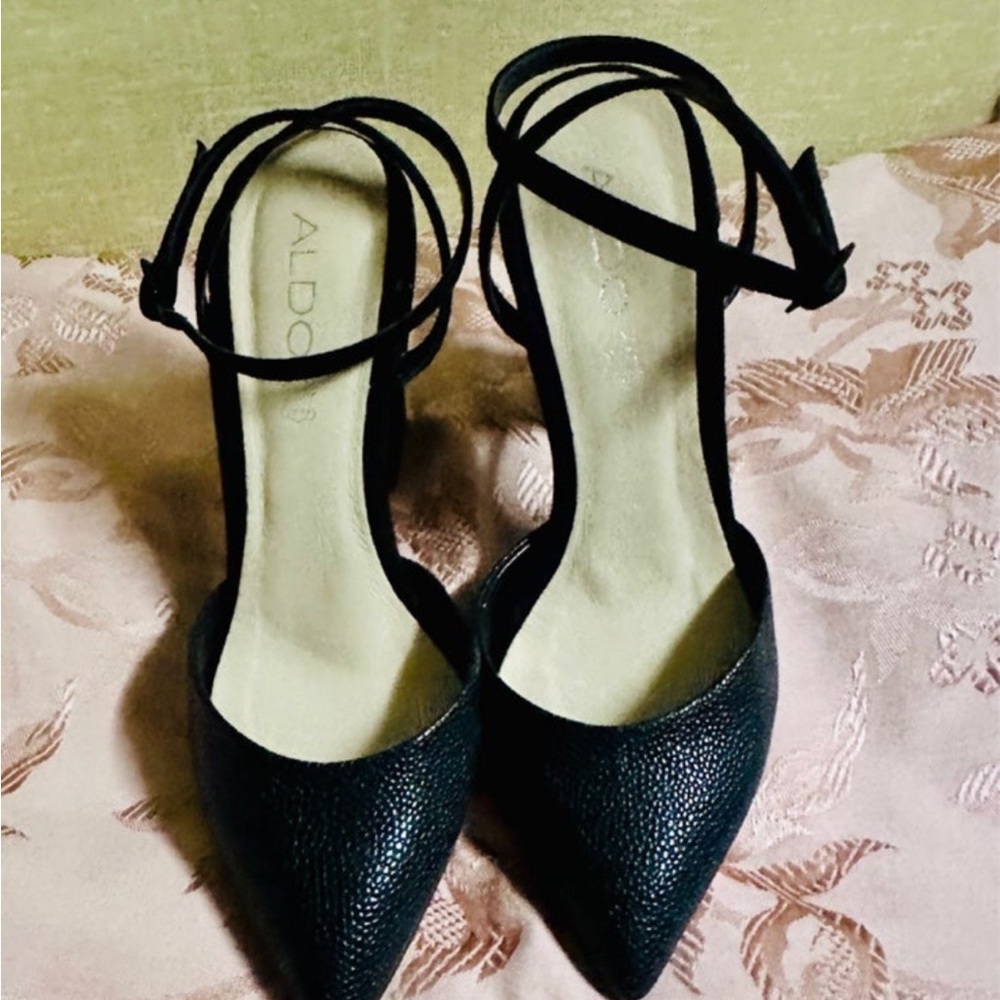 Also black ankle strap heels